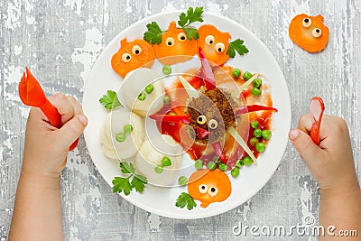 Creative idea for baby dinner or lunch. Funny spider meatball wi Stock Photo