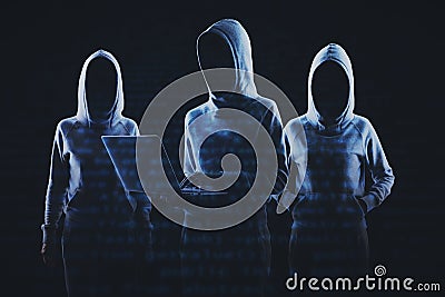 Creative image of a group of hackers in hoodies standing on abstract dark coding background. Malware, phishing and theft concept. Stock Photo