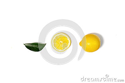 Creative layout made of lemon and green leaf. Stock Photo