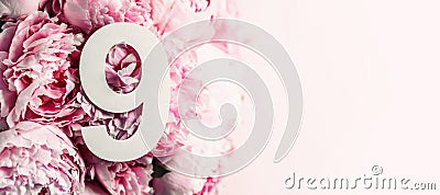 Creative layout. Pink peony flowers and digit nine 9. Birthday greeting card. Anniversary concept. Top view. Copy space. Stylish Stock Photo