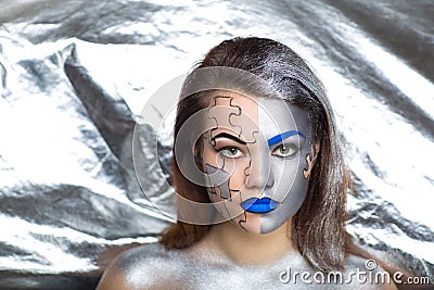 Silver body art Stock Photo