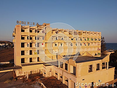 creative marriage proposal in the form of a graffiti on a not yet finished apartment block in cypres Editorial Stock Photo