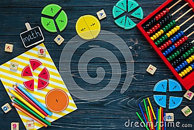 Creative Ð¡olorful math fractions and abacus on dark background. Interesting funny math for kids. Education, back to school Stock Photo