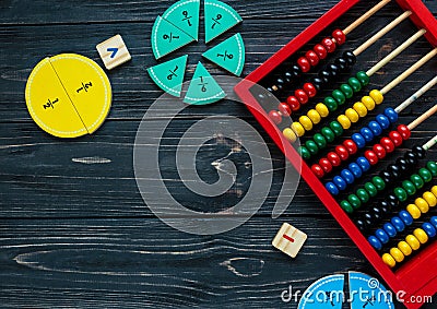 Creative Ð¡olorful math fractions on dark background. Interesting funny math for kids. Education, back to school concept Stock Photo