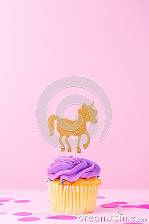 Creative pastel fantasy holiday card with cupcake, confetti and Stock Photo