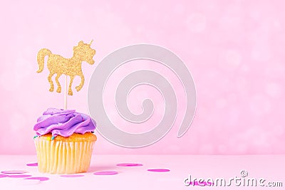 Creative pastel fantasy holiday card with cupcake, confetti and Stock Photo
