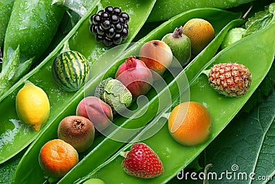 Creative pea with different fruits instead grains of pea. Stock Photo