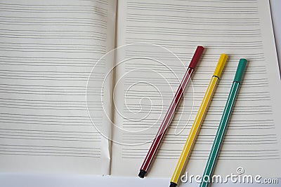 Watercolor pen and notebook Stock Photo