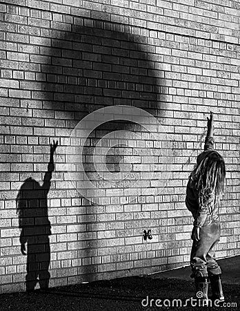 Playing Basketball with Your Shadow Stock Photo