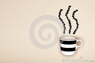 Creative pop art cup of coffee pastel coloured background. Coffee mug and roasted coffee beans. Stock Photo