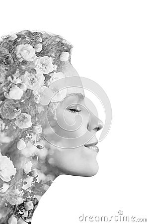 Creative portrait of beautiful young woman made from double exposure effect using photo of roses flowers, isolated on white Stock Photo