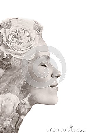 Creative portrait of beautiful young woman made from double exposure effect using photo of roses flowers, isolated on white Stock Photo