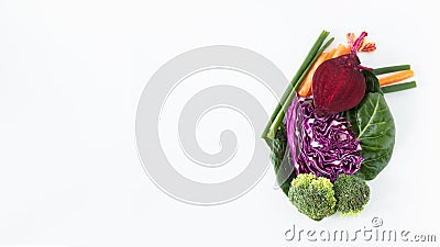 Creative realistic human heart shape made with fresh colorful organic fruits and vegetables isolated on white background Stock Photo