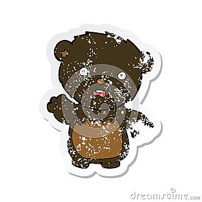 A creative retro distressed sticker of a cartoon worried black bear Vector Illustration