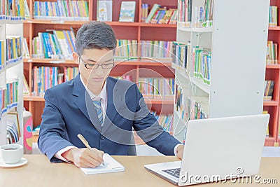 Creative student or businessman working with his laptop Stock Photo