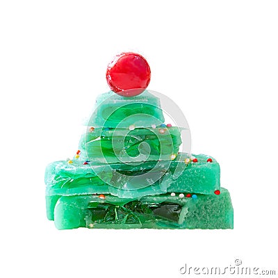 Creative sweet Christmas tree made of pieces of green split lollipop stacked in slide. Stock Photo