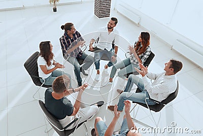 Creative team holds a meeting in the lobby Stock Photo