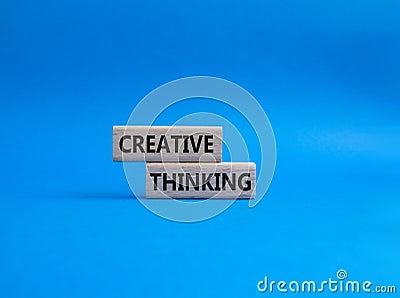 Creative thinkig symbol. Wooden blocks with words Creative thinkig. Beautiful blue background. Business and Creative thinkig Stock Photo