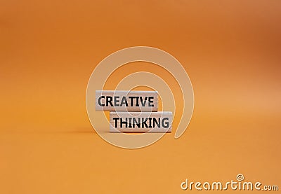 Creative thinkig symbol. Wooden blocks with words Creative thinkig. Beautiful orange background. Business and Creative thinkig Stock Photo