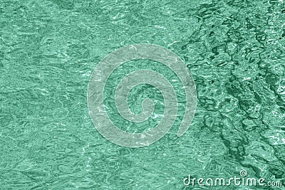 Creative water background toned in light mint color, flat lay Stock Photo