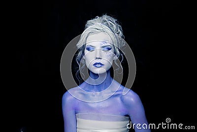 Creative woman with makeup. Halloween and theatre concept Stock Photo