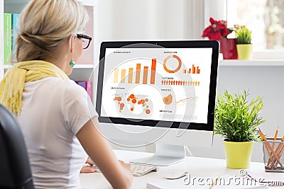 Creative woman working with computer in the office Stock Photo