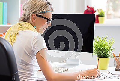 Creative woman working in the office Stock Photo