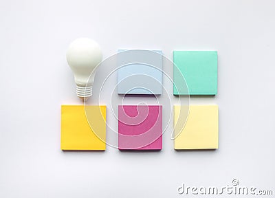 Creativity inspiration concepts with lightbulb and notepaper Stock Photo