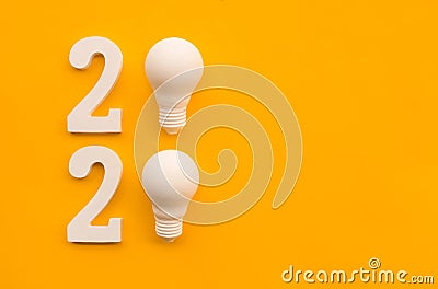 2020 creativity inspiration concepts with text nuber and lightbulb on color background Stock Photo