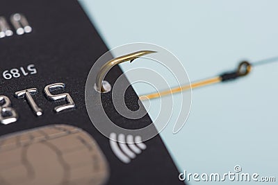 Credit card on fishing hook fraud data leak money stealing phishing concept Stock Photo