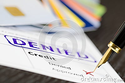 Credit form macro shot and stamp denied, credit cards and pen. Stock Photo