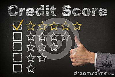 Credit score five 5 star rating. thumbs up service golden rating stars on chalkboard Stock Photo