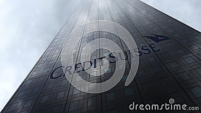 Credit Suisse Group logo on a skyscraper facade reflecting clouds. Editorial 3D rendering Editorial Stock Photo