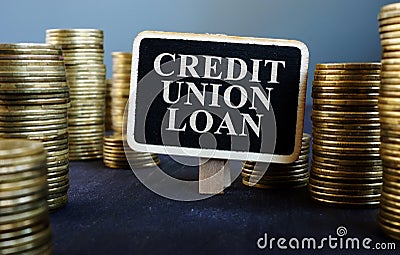 Credit union loan sign on wooden plate and money Stock Photo