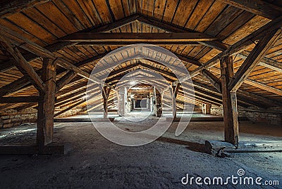 Creepy attic interior at abandoned building Stock Photo