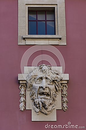 Creepy face sculpture and window above it. S. JoÃ£o National Theater, Porto, Portugal Editorial Stock Photo