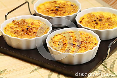 Creme brulee in ramekins Stock Photo