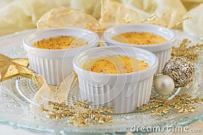 Creme brulee - traditional french vanilla cream dessert with caramelised sugar on top. Stock Photo