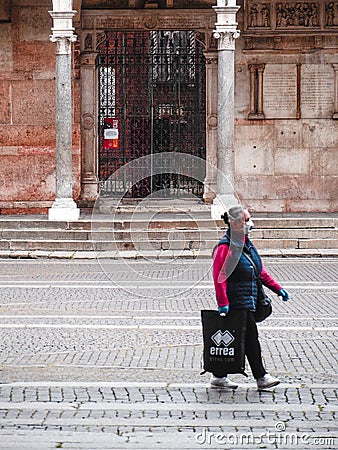 Cremona, Lombardy, Italy - 13 th may 2020 - People grocery shopping socially distance d in local biologic open food market Editorial Stock Photo