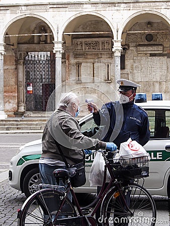 Cremona, Lombardy, Italy - 13 th may 2020 - People grocery shopping socially distance d in local biologic open food market Editorial Stock Photo