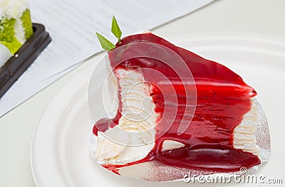 Crepe cake bakery piece with strawberry sauce Stock Photo