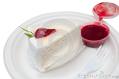 Crepe cake bakery piece with strawberry sauce Stock Photo