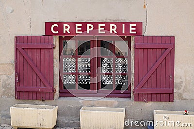 Creperie french text sign means battercake on restaurant building in upper old town in France brittany Stock Photo