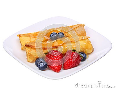Crepes with Berries. Rolled Pancakes with Strawberry, Blueberry Stock Photo