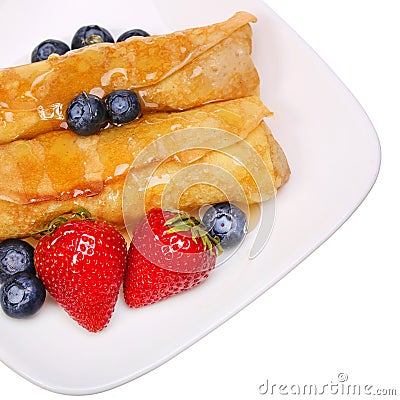 Crepes with Berries. Rolled Pancakes with Strawberry, Blueberry Stock Photo