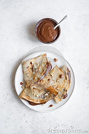 Crepes with chocolate and nuts Stock Photo