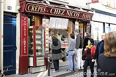 Crepes street restaurant i Paris Editorial Stock Photo