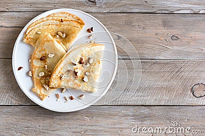 Crepes with honey and nuts Stock Photo