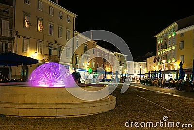 Cres city bay on cres island at night colorful Fontana Jadren fountain Stock Photo