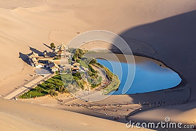 Crescent Moon Lake at Singing Sands Dune near Dunhuang, Gansu Province, Chi Stock Photo